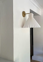 Wall panelling with a wall lamp