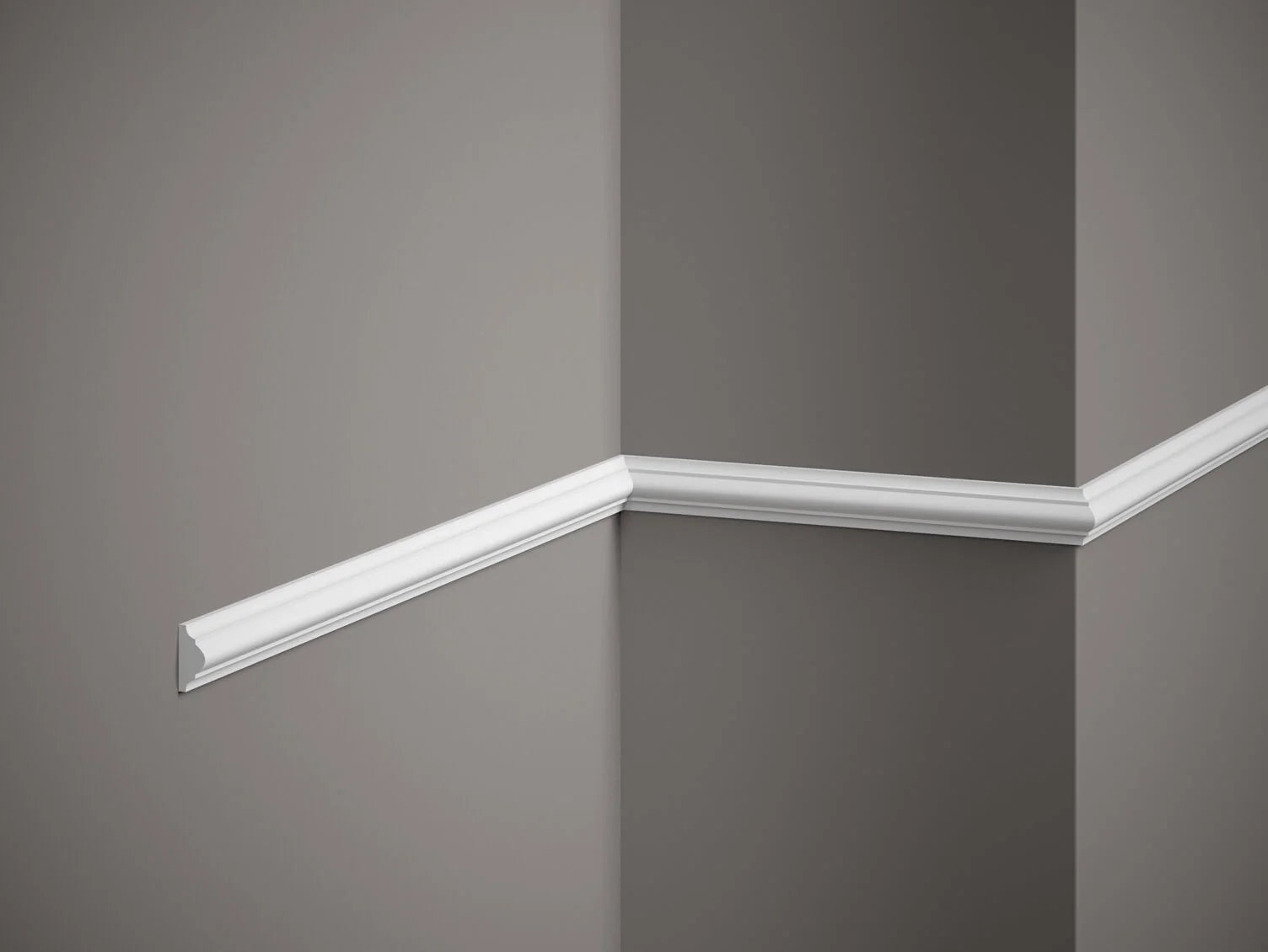 White crown molding on a gray wall