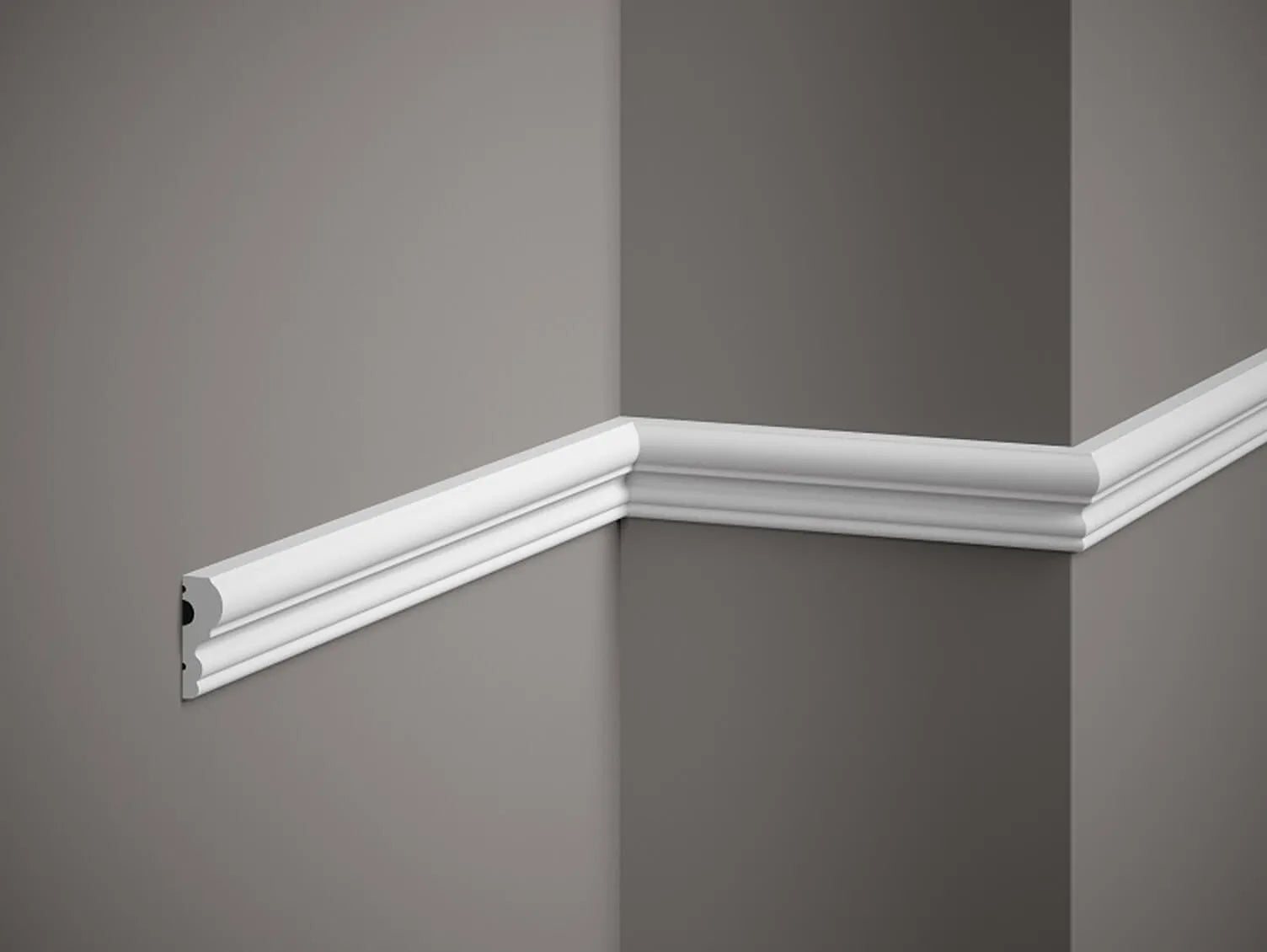White crown molding on a gray wall