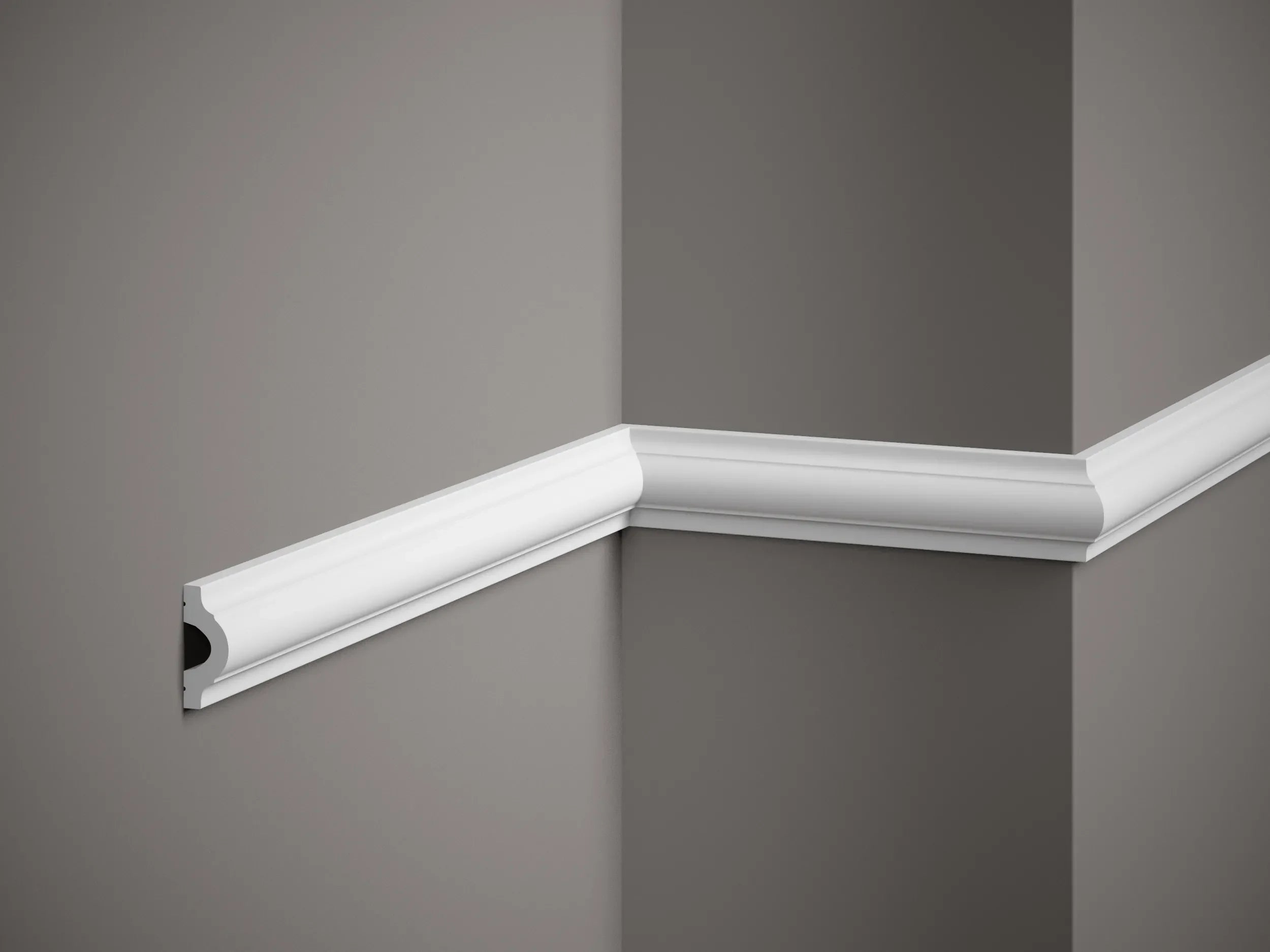 White crown molding on a gray wall