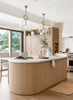 Modern kitchen with wooden oak panelled island and white countertops