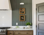 a kitchen with green shiplat wall panelling